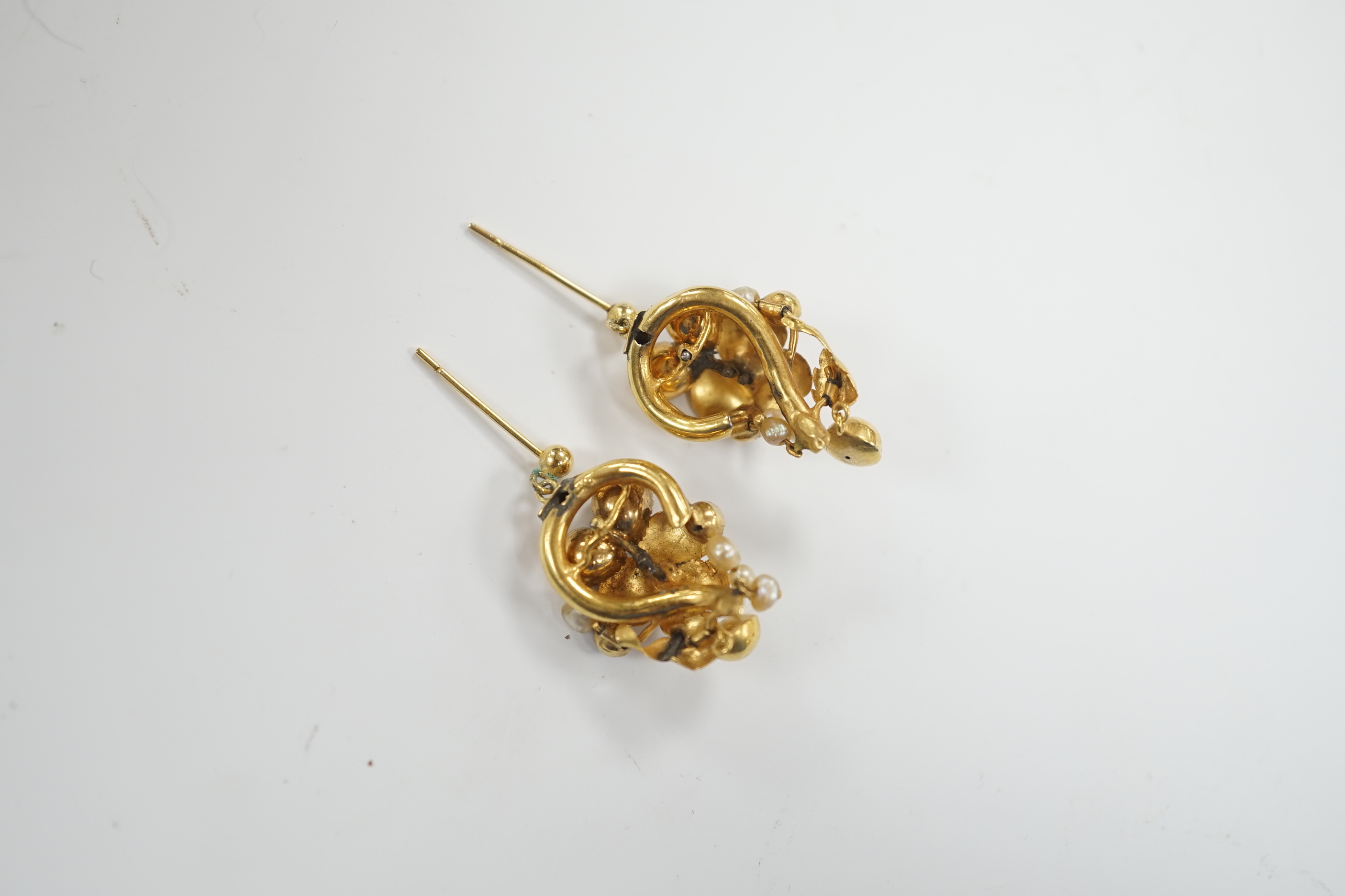 A pair of Victorian yellow metal, garnet and pearl set drop earrings, of foliate form, 31mm (adapted?), gross weight 6.8 grams.